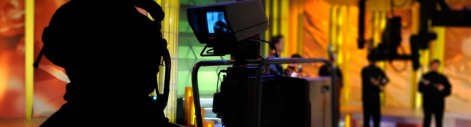 Image of a news set from behind the camera person